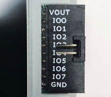 10 pin right able connector. Black shroud with IO pin names printed in white silkscreen.